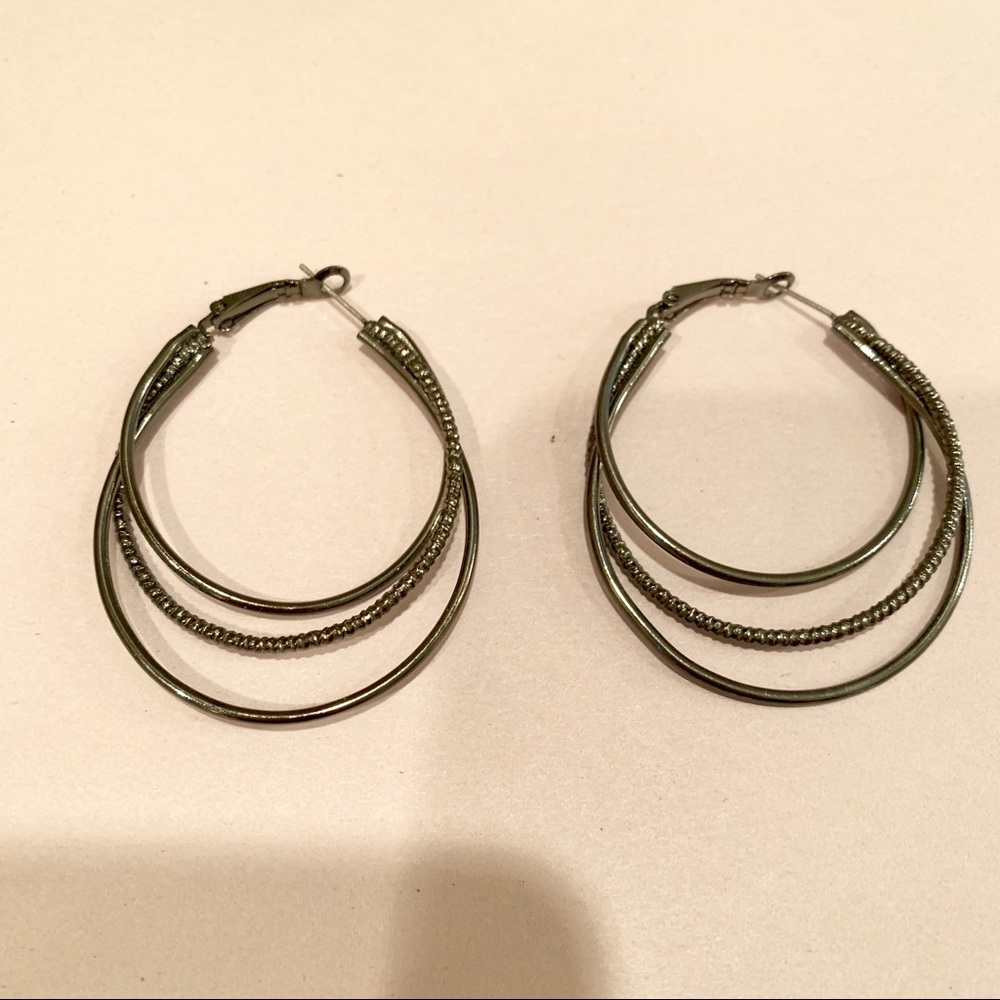 Gray metal hoop earrings.
